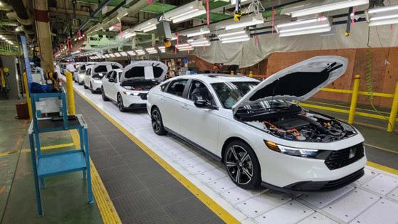 Henry Payne/The Detroit News/TNS