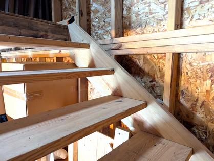 The flat stair treads shown here are mortised into the angled 2x12 board known as a stair stringer. Stringers serve the same purpose as the floor joists in your home. (Tim Carter/Tribune Content Agency)