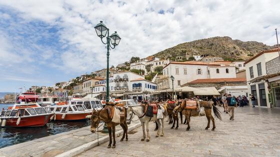 Hydra has no real roads, no cars, and no bicycles — so things are transported by donkeys. (Addie Mannan, Rick Steves’ Europe)