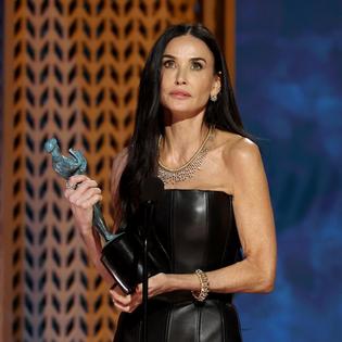 Bang Showbiz / Demi Moore has recalled her ex-husband Bruce Willis' love for Neil Diamond