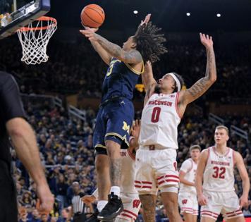 Robin Buckson/The Detroit News/TNS