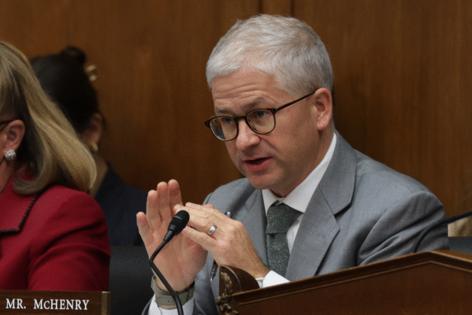 Alex Wong/HODELETE60/TNS