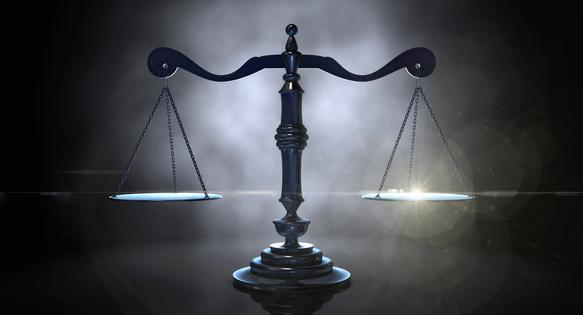 Scales of justice. Dreamstime/TCA