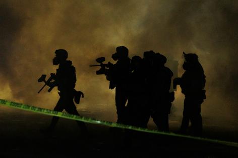 Federal agents deploy tear gas as residents protest a federal agent-involved shooting during an immigration enforcement operation in Minneapolis, Minn., on Jan. 14, 2026. Madison Thorn/Anadolu via Getty Images