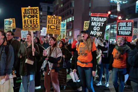 Demonstrators rally before marching to the White House in Washington on Jan. 8, 2026.
              AP Photo/Jose Luis Magana