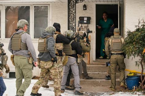 Teyana Gibson Brown, wife of Liberian immigrant Garrison Gibson, reacts after a federal immigration officer arrested her husband in a warrantless raid in Minneapolis, Jan. 11, 2026, in what a judge later ruled was a violation of Gibson's Fourth Amendment rights. AP Photo/John Locher