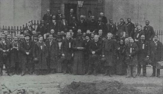 Attendees at the 1892 Colored Catholic Congress included the nation's first openly Black priest, Augustus Tolton, who stands in the middle of the front row. Wikimedia Commons