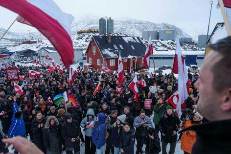 People protest President Donald Trump’s desire to own Greenland outside the U.S. consulate in Nuuk, Greenland, in January 2026.
              AP Photo/Evgeniy Maloletka