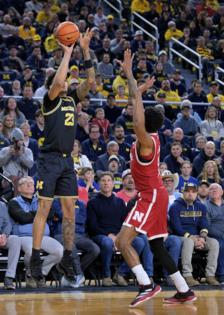 Robin Buckson/The Detroit News/TNS