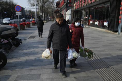 WANG ZHAO/Getty Images North America/TNS