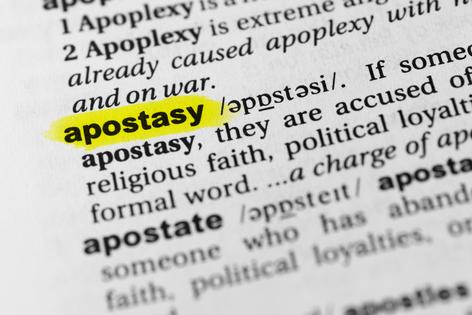 Highlighted English word ‘apostasy’ and its definition in the dictionary. Dreamstime/TCA