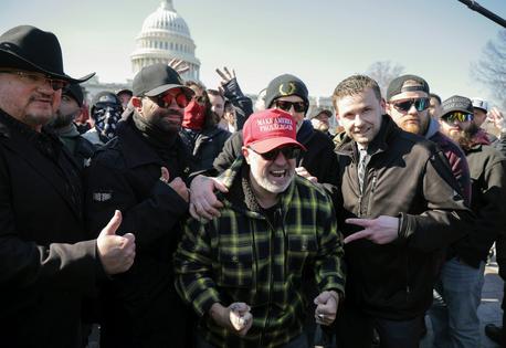 From left, Stewart Rhodes, leader of the Oath Keepers, and Enrique Tarrio, Joe Biggs and Zach Rehl, members of the alt-right group the Proud Boys, rally outside the U.S. Capitol on Feb. 21, 2025.
              Chip Somodevilla/Getty Images