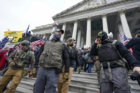 Members of the Oath Keepers stand on the East Front of the U.S. Capitol on Jan. 6, 2021.
              AP Photo/Manuel Balce Ceneta, File