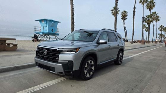 Henry Payne/The Detroit News/TNS