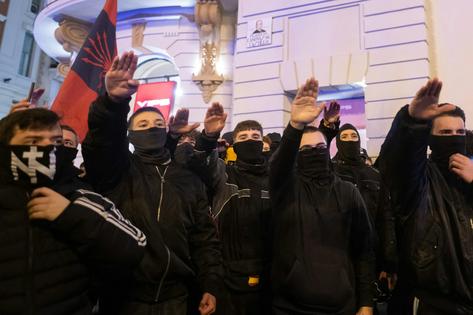 Protesters associated with a far-right group known as Nuncio Nacional extend a fascist salute on Jan. 24, 2026, demonstrating that the ideology still has some traction in Spain. Getty Images/Marcos del Mazo