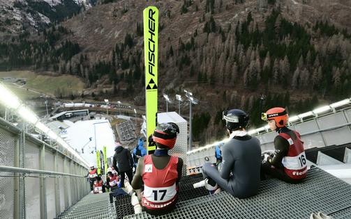 Athletes train at the ski jumping arena prior to the Open Italian Championship in Predazzo, a 2026 Winter Olympics venue, on Dec. 23, 2025.
              Stefano Rellandini/AFP via Getty Images
