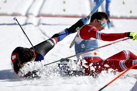 Russia’s Alexander Terentev, right, and Czech Republic’s Michal Novak crash during a men’s cross-country sprint quarterfinal race at the FIS Nordic World Ski Championships in Oberstdorf, Germany, on Feb. 25, 2021.
AP Photo/Matthias Schrader