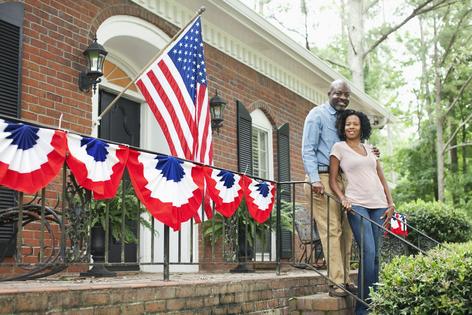 Homeownership, often considered key to the American Dream, is difficult to achieve for many families due to rising housing costs. Kingfisher Productions via Getty Images