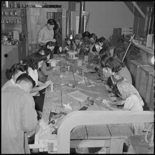 Japanese Americans incarcerated at Heart Mountain concentration camp in Wyoming took art classes at the craft shop, using what they could find. Tom Parker, War Relocation Authority, Department of the Interior, via National Archives and Records Administration