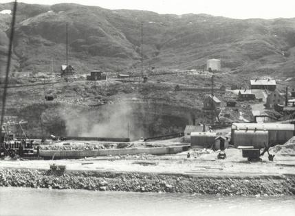 Greenland's cryolite mine, essential for U.S. airplane production, was below sea level and vulnerable to Nazi sabotage. Reginald Wilcox, ca. 1941. Peary–MacMillan Arctic Museum, Bowdoin College