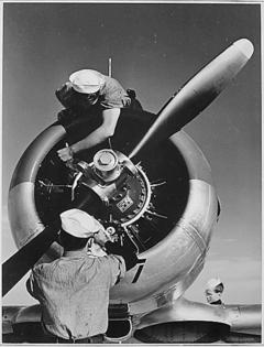 Aluminum was crucial for modern militaries. Mechanics check an airplane engine at Naval Air Station Corpus Christi, Texas, in November 1942.
              Fenno Jacobs/Department of Defense