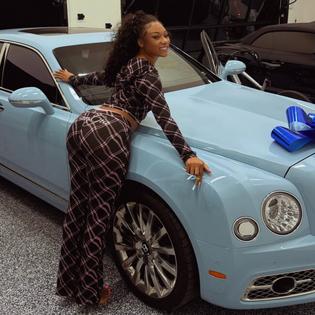Bang Showbiz / Megan Thee Stallion posing with her 31st birthday gift