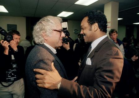 Bernie Sanders, then the mayor of Burlington, greets Jesse Jackson backstage at a 1988 Vermont rally where he endorsed Jackson's presidential bid. AP Photo/Toby Talbot