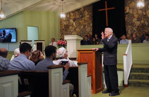 Former U.S. President Jimmy Carter speaks to the congregation at Maranatha Baptist Church before teaching Sunday school in his hometown of Plains, Ga., on April 28, 2019, at age 94. After leaving the White House in 1981, Carter taught Sunday school at the church on a regular basis.
Paul Hennessy/NurPhoto via Getty Images