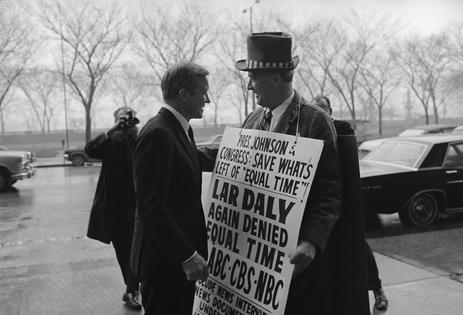 Sen. Charles Percy, R-Ill., left, talks with Lar Daly, who protests the lack of equal time on television.
              AP Photo/Paul Cannon