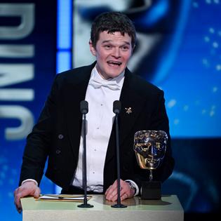 Bang Showbiz / Robert Aramayo accepting the Best Leading Actor gong at the 2026 BAFTA Film Awards