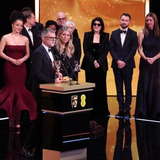 Bang Showbiz / One Battle After Another's team accepting the Best Film gong at the 2026 EE BAFTA Film Awards