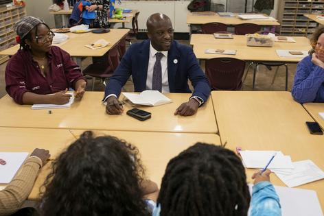 Colorado Springs Mayor Yemi Mobolade answers students’ questions during an after-school art program at Adams Elementary School in Colorado Springs.
Rachel Woolf/The Washington Post via Getty Images