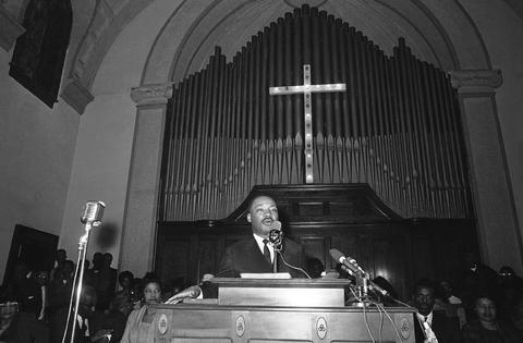 Martin Luther King Jr. delivers a eulogy in Selma, Ala., for James Reeb, a fellow minister who was beaten to death.
              AP Photo