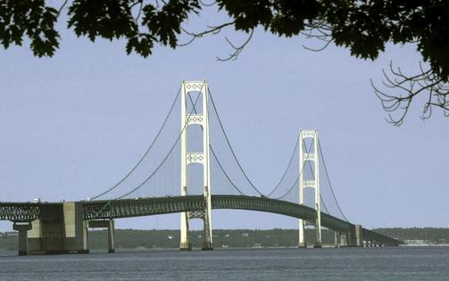 An oil pipeline runs under the Straits of Mackinac, connecting Lake Michigan and Lake Huron and separating Michigan's Lower Peninsula from its Upper Peninsula. AP Photo/Carlos Osorio