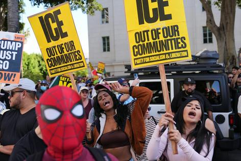 People protest in Los Angeles against the immigration crackdown on Jan. 30, 2026.
              AP Photo/Jae C. Hong