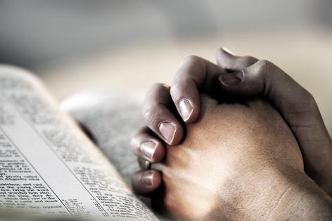 Praying hands. Dreamstime/TCA