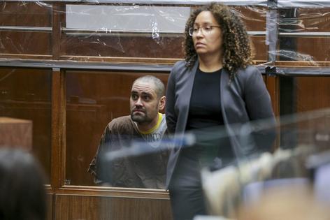 Nick Reiner appears with deputy public defender Kimberly Greene during his arraignment in Los Angeles on Feb. 23, 2026. The son of U.S. movie director Rob Reiner pleaded not guilty to the fatal stabbing of his parents.
AFP/Chris Torres via Getty Images