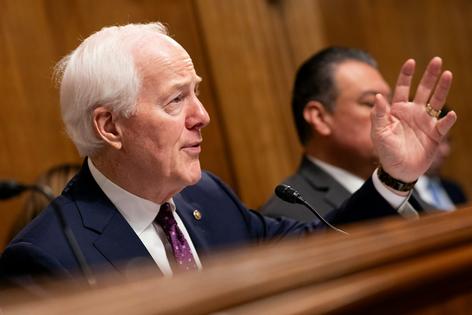 U.S. Sen. John Cornyn, a Texas Republican, speaks at a Senate hearing investigating fraud in the Medicaid program in Minnesota. Medicaid is a joint federal-state program.
              AP Photo/Nathan Howard