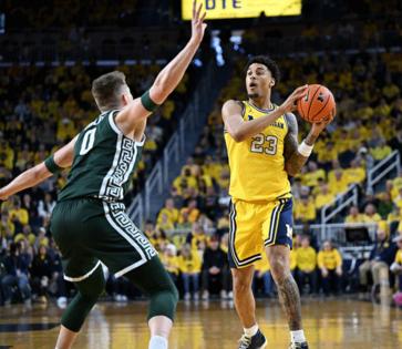 Robin Buckson/The Detroit News/TNS