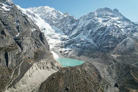 Tam Pokhari glacial lake in Nepal had an outburst flood in 1998 after the basin filled with water and broke through its moraine, leaving a deep gash. The resulting flood was estimated at more than 350,000 cubic feet per second, equivalent to approximately 60% of the Mississippi River’s flow.
              Jonathan Jacquet/Scott McCoy
