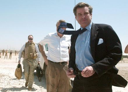 L. Paul Bremer prepares to board a helicopter in Hillah, Iraq, during a farewell tour of the country on June 17, 2004.
              AP Photo/Wathiq Khuzaie