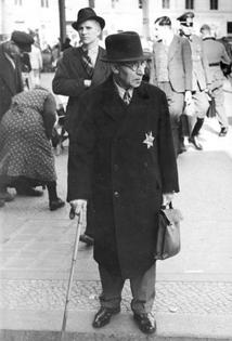 Laws in Nazi Germany forced Jewish people to wear a yellow Star of David badge from 1941 onward.
              Bundesarchiv, Bild 183-R99993/German Federal Archives via Wikimedia Commons, CC BY-SA