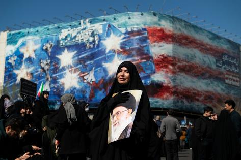 In Tehran on March 1, 2026, a woman mourns the death of Iranian leader Ayatollah Ali Khamenei.
              Negar/Middle East Images/AFP via Getty Images