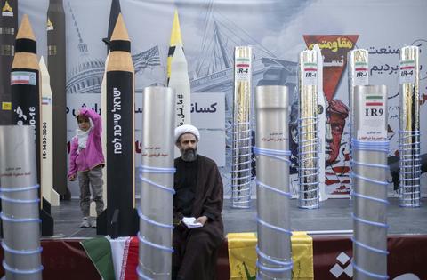 Scale models of Iranian ballistic missiles and centrifuges are displayed in Tehran in November 2025.
              Morteza Nikoubazl/NurPhoto via Getty Images