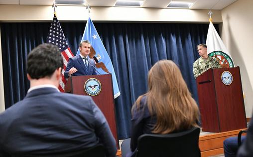 Secretary of Defense Pete Hegseth, left, and Adm. Charles Bradford Cooper II, commander of U.S. Central Command, during a press conference at U.S. Central Command headquarters in Tampa, Fla., on March 5, 2026.
              Octavio Jones/AFP via Getty Images
