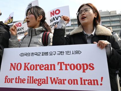 Jung Yeon-je/AFP/GETTY IMAGES NORTH AMERICA/TNS