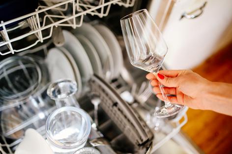 Your cups and dishes may be coming out spotty or cloudy, but you can fix that. (lechatnoir/Getty Images/iStockphoto/TCA)
