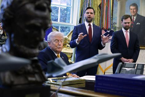 WASHINGTON, DC - MARCH 16: U.S. President Donald Trump and  Federal Trade Commission Chairman Andrew Ferguson listen as Vice President JD Vance (C) speaks to the media after U.S. President Donald Trump signed paperwork during a White House signing ceremony in the Oval Office of the White House on March 16, 2026 in Washington, DC. Trump signed an executive order to create a task force on fraud which will be lead by Vice President J.D. Vance. (Photo by Alex Wong/Getty Images)