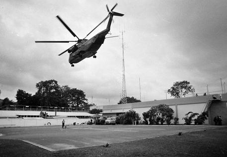 In this April 29, 1975, file photo, a helicopter lifts off from the U.S. Embassy in Saigon, South Vietnam, during a last-minute evacuation of authorized personnel and civilians.
AP Photo.