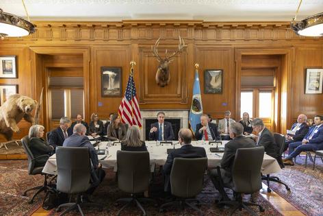 Interior Secretary Doug Burgum, center between flags, meets with governors and representatives of the seven Colorado River basin states in January 2026.
U.S. Department of the Interior via X